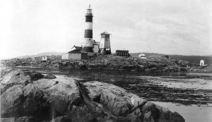 In this 1915 image from the BC Archives, a fog-horn building was the building which first occupied this location.